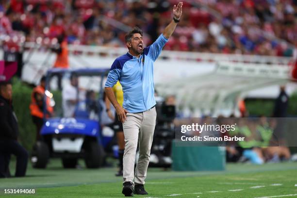 Head coach Veljko Paunovic of Chivas gives instructions to his players during the 3rd round match between Chivas and Necaxa as part of the Torneo...