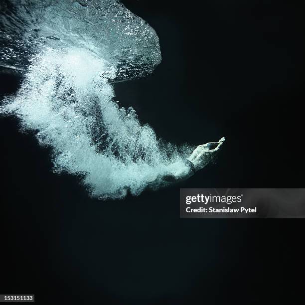 swimmer underwater after jump - dive stockfoto's en -beelden