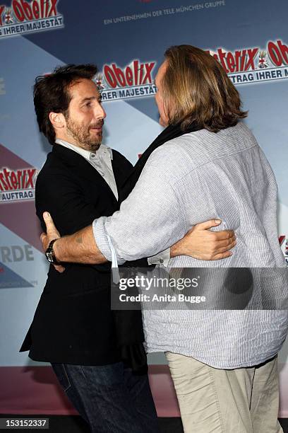 French actors Edouard Baer and Gerard Depardieu attend the "Asterix & Obelix God Save Britannia" photocall at Hotel de Rome on October 1, 2012 in...