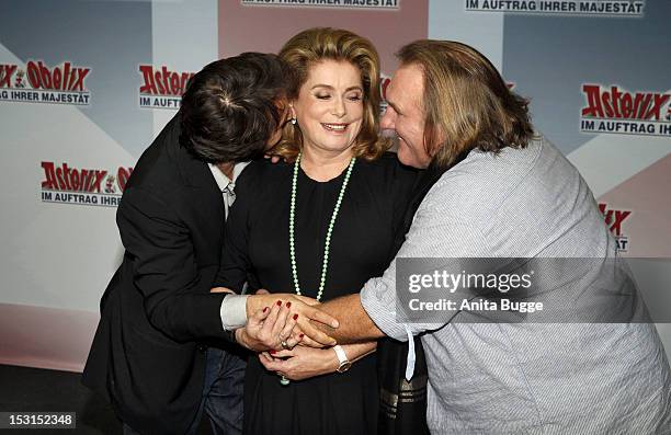 French actors Edouard Baer , Catherine Deneuve and Gerard Depardieu attend the "Asterix & Obelix God Save Britannia" photocall at Hotel de Rome on...