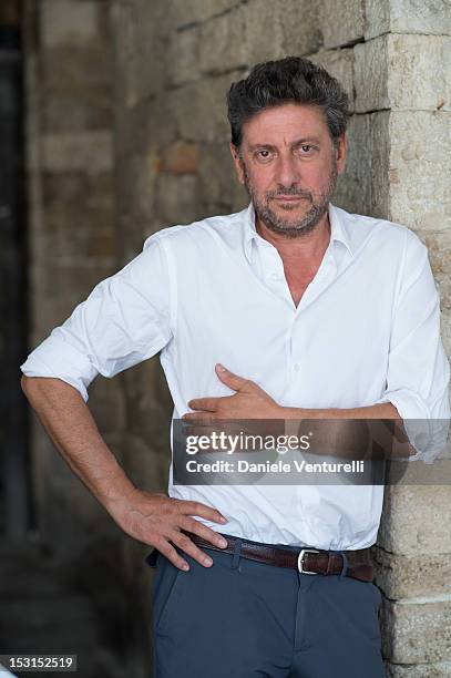 Actor Sergio Castellitto poses during a photocall for the 'Una Famiglia Perfetta' on October 1, 2012 in Todi, Italy.