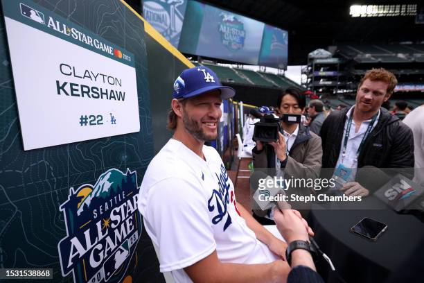 Clayton Kershaw of the Los Angeles Dodgers speaks to the media during Gatorade All-Star Workout Day at T-Mobile Park on July 10, 2023 in Seattle,...