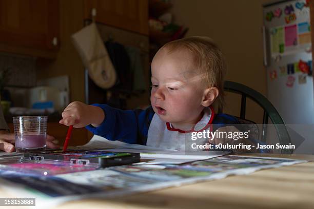 painting - baby paint stock pictures, royalty-free photos & images