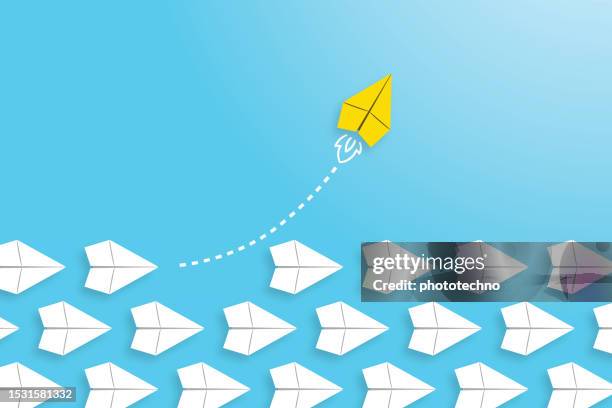 change concepts with yellow paper airplane leading among white - strategic initiative stock illustrations