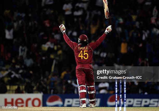 Chris Gayle of West Indies reacts after winning the Super Over during the Super Eights Group 1 match between New Zealand and West Indies at Pallekele...