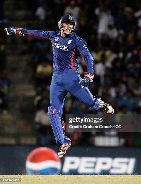 Jonny Bairstow of England reacts after taking a catch to dismiss Kumar Sangakkara of Sri Lanka during the Super Eights Group 1 match between England...