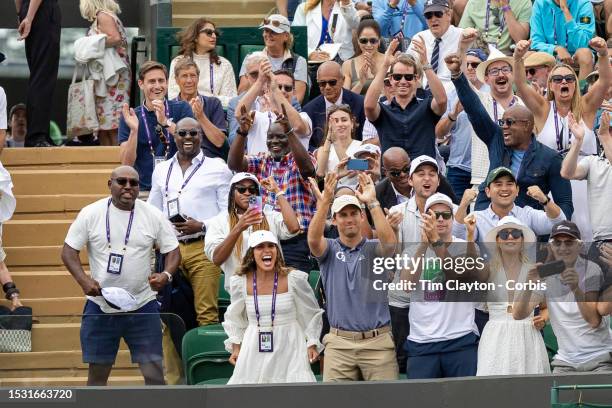 Coco Gauff of the United States with parents Candi Gauff and Corey Gauff along with family and supporters celebrate the victory of Christopher...