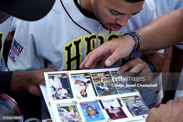 Gustavo Nava Sanchez of Southern University looks at baseball cards during the HBCU Swingman Classic at T-Mobile Park on July 07, 2023 in Seattle,...
