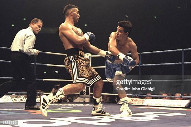 Remigio Molina of Argentina misses with a right during the Naseem Hamed v Remigio Molina World title fight at the Nynex Arena, Manchester. Prince...
