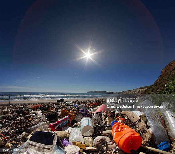 waste on beach - s0ulsurfing stock pictures, royalty-free photos & images