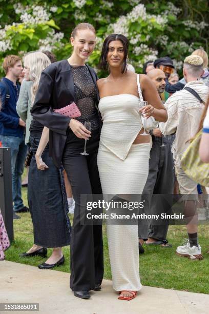 Georgia Moot and Simran Randhawa attend the BFC Summer Party 2023 at The Serpentine Pavilion on July 10, 2023 in London, England.