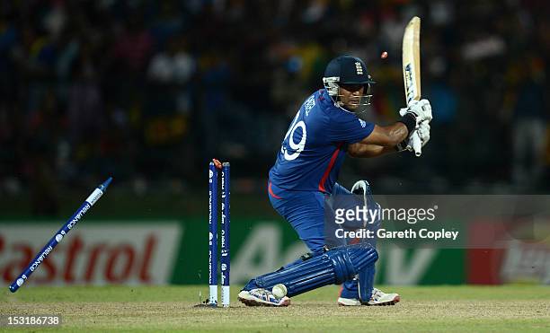 Samit Patel of England is bowled by Lasith Malinga of Sri Lanka during the ICC World Twenty20 2012 Super Eights Group 1 match between Sri Lanka and...