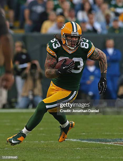 Tom Crabtree of the Green Bay Packers runs against the New Orleans Saints at Lambeau Field on September 30, 2012 in Green Bay, Wisconsin. The Packers...