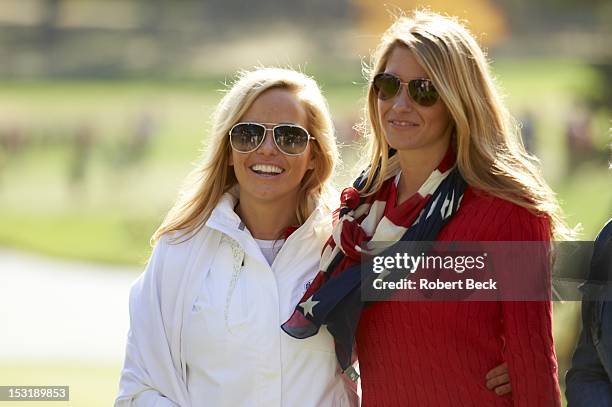 Amy Mickelson, wife of Team USA Phil Mickelson, and Jillian Stacey, girlfirend of Keegan Bradley posing during Saturday Foursomes at Medinah CC....