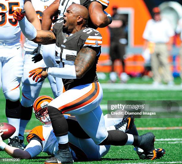 Defensive linemen Jaqua Parker of the Cleveland Browns celebrates after making a tackle during a game with the Cincinnati Bengals at Paul Brown...