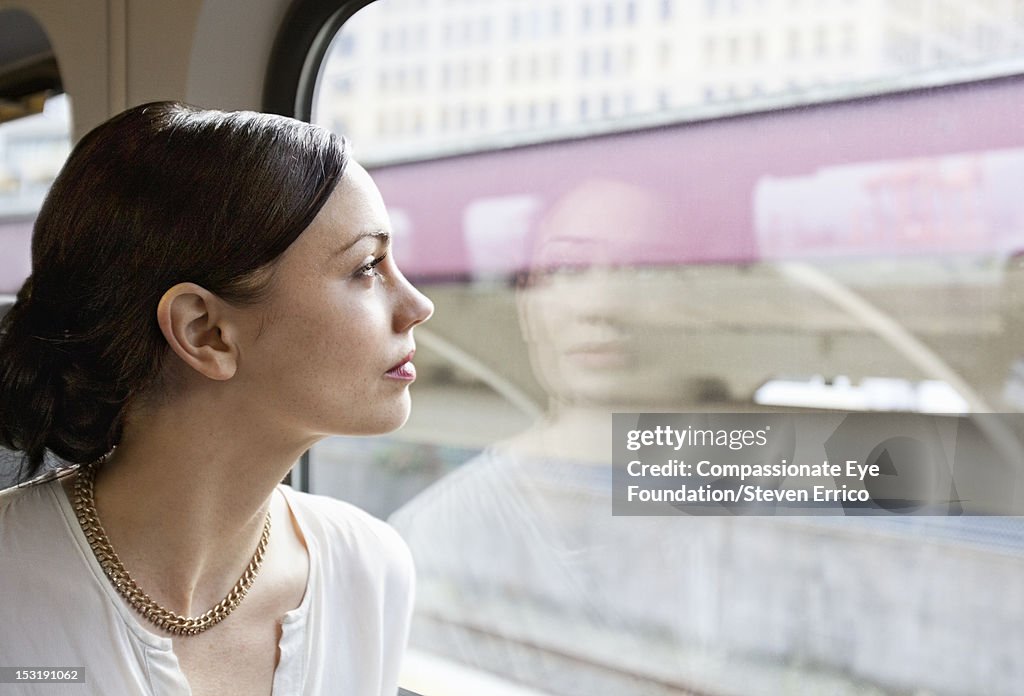 Young woman on train, close up