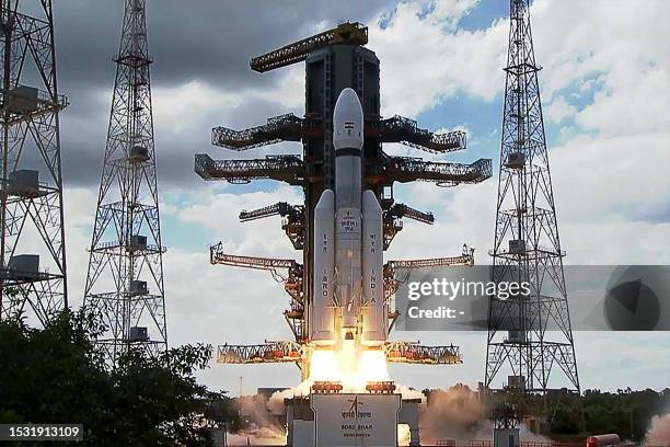 This screen grab made from video footage from ISRO via AFPTV taken on July 14, 2023 shows an Indian Space Research Organisation rocket carrying the...