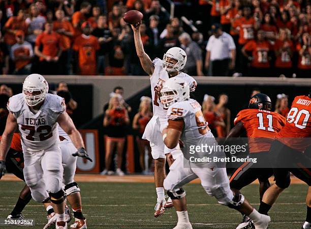Quarterback David Ash of the Texas Longhorns throws against the Oklahoma State Cowboys on September 29, 2012 at Boone Pickens Stadium in Stillwater,...
