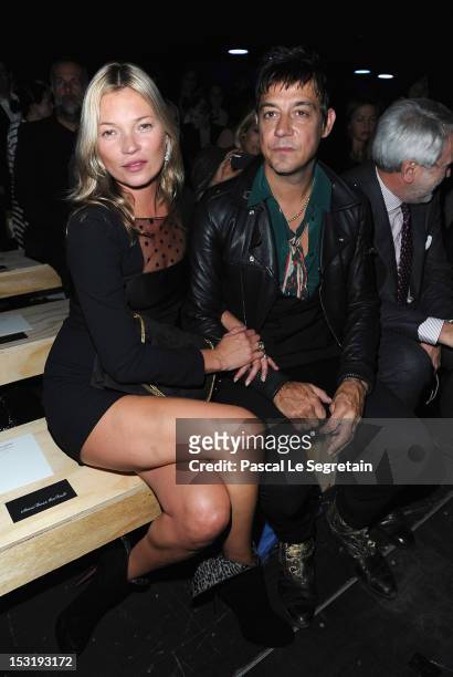 Kate Moss and Jamie Hince attends the Saint Laurent Spring / Summer 2013 show as part of Paris Fashion Week on October 1, 2012 in Paris, France.