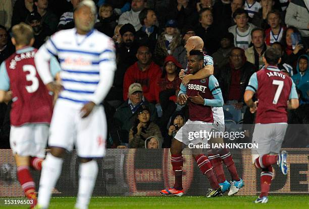 West Ham United's Portugese player Ricardo Vaz Te celebrates scoring his goal during an English Premier League football match between Queens Park...