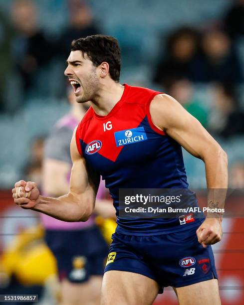 Christian Petracca of the Demons celebrates a goal during the 2023 AFL Round 18 match between the Melbourne Demons and the Brisbane Lions at the...