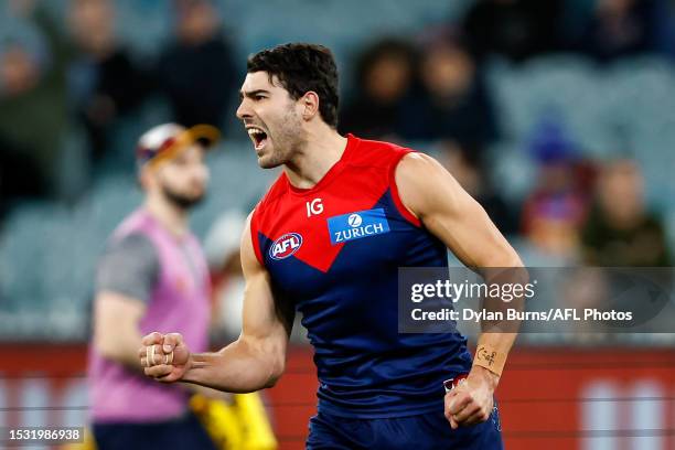 Christian Petracca of the Demons celebrates a goal during the 2023 AFL Round 18 match between the Melbourne Demons and the Brisbane Lions at the...