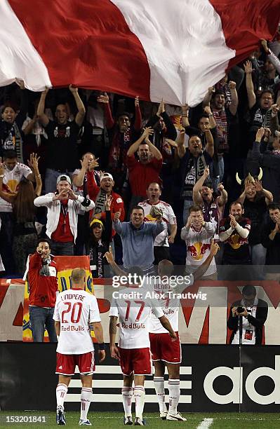 The New York Red Bulls celebrate their final goal against Toronto FC at Red Bull Arena on September 29, 2012 in Harrison, New Jersey.