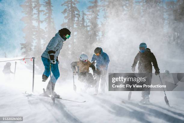 friends getting ready to go skiing on a sunny winter day - disabled extreme sports stock pictures, royalty-free photos & images