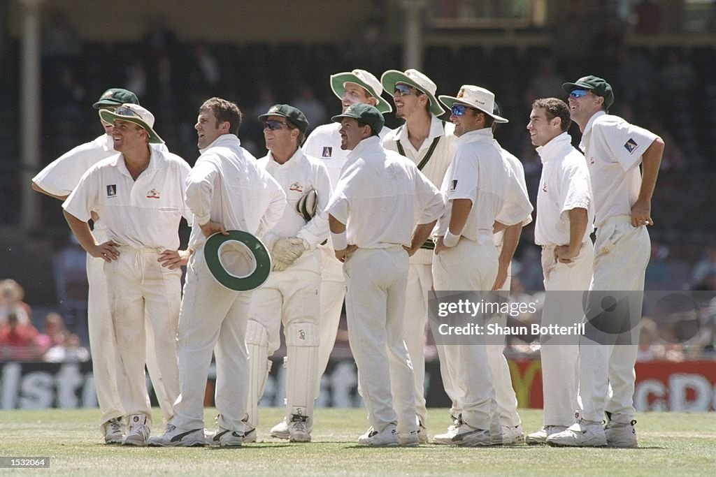 Australia watch the replay of Mark Taylor's catch to dismiss Carl Hooper