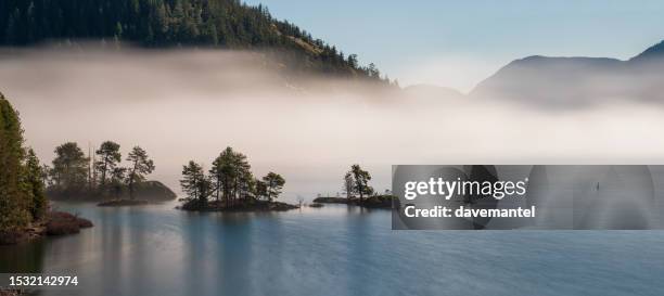 gordon bay in the fog lake cowichan - cowichan bay stock pictures, royalty-free photos & images