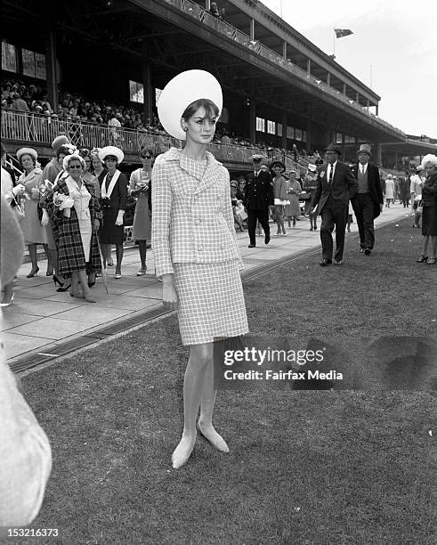 English model Jean Shrimpton at Flemington races on Melbourne Cup day, November 2 1965. She wore a three-piece grey and beige tweed suit four inches...