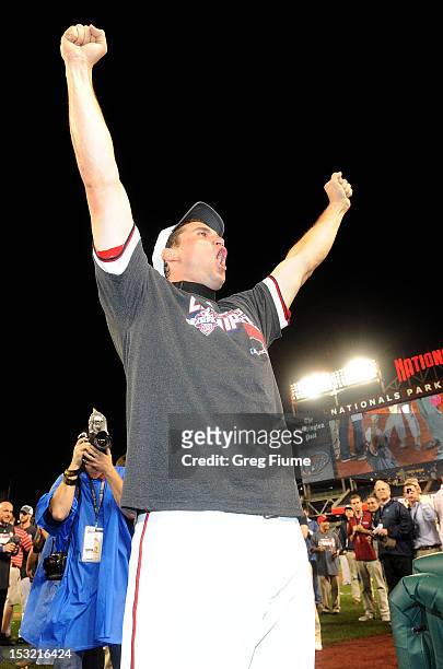 Ryan Zimmerman of the Washington Nationals celebrate after winning the National League East Division Championship after the game against the...