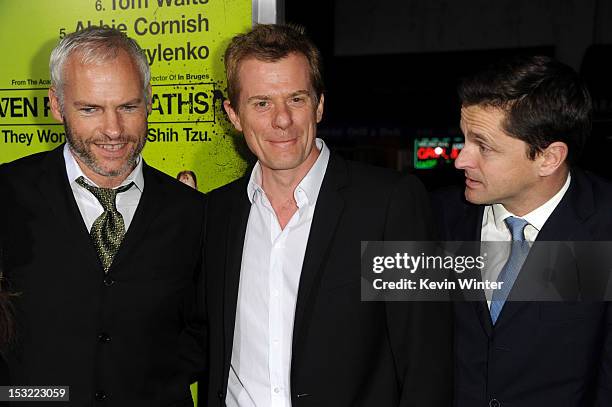 Writer/director Martin McDonagh, producers Graham Broadbent, and Peter Czernin arrive at the premiere of CBS Films' "Seven Psychopaths" at Mann Bruin...