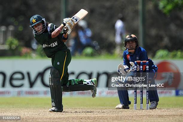 Nain Abidi of Pakistan in action as Sulakshana Naik of India watches during the ICC Women's World Twenty20 2012 Group A match between India and...