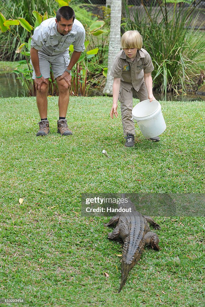 Robert Irwin Feeds Freshwater Crocodiles At Australia Zoo