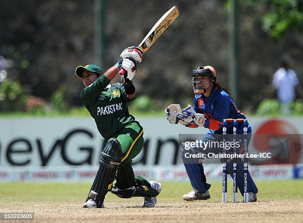 Nida Rashid of Pakistan in action as Sulakshana Naik of India watches during the ICC Women's World Twenty20 2012 Group A match between India and...