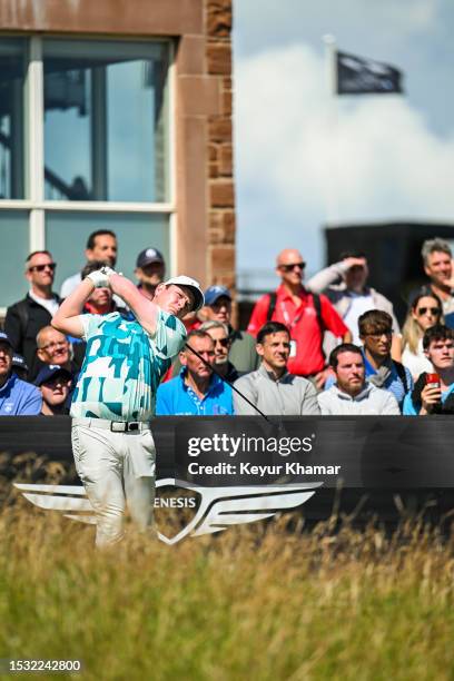 Robert MacIntyre of Scotland plays his shot from the third tee during the first round of the Genesis Scottish Open at The Renaissance Club on July...