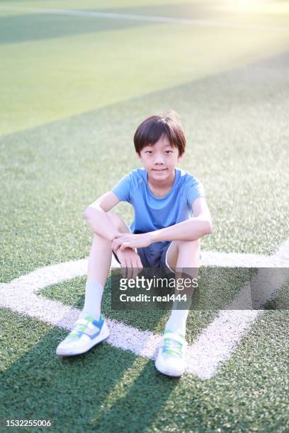 boy with soccer ball - 13 year old cute boys stock pictures, royalty-free photos & images