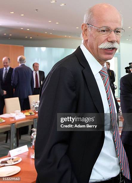 Dieter Zetsche, chairman of Daimler AG, stands prior to a meeting in the German federal chancellory on October 1, 2012 in Berlin, Germany. German...