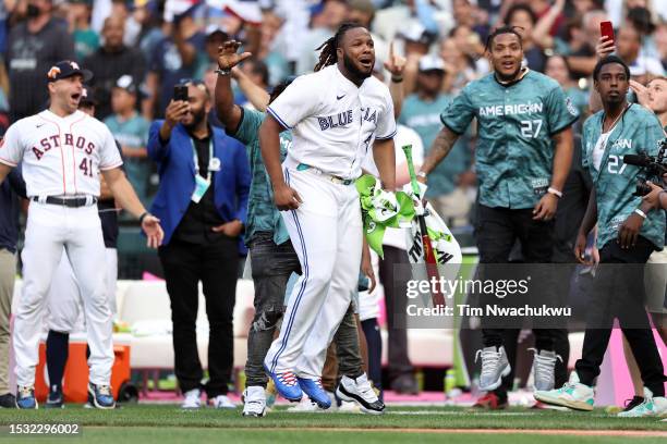 Vladimir Guerrero Jr. #27 of the Toronto Blue Jays celebrates after winning the T-Mobile Home Run Derby at T-Mobile Park on July 10, 2023 in Seattle,...