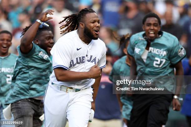 Vladimir Guerrero Jr. #27 of the Toronto Blue Jays celebrates after winning the T-Mobile Home Run Derby at T-Mobile Park on July 10, 2023 in Seattle,...