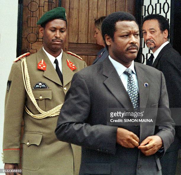 Burundi's President Pierre Buyoya leaves a closed meeting with peace facilitator Nelson Mandela 28 August 2000 in Arusha. Buyoya and most delegations...