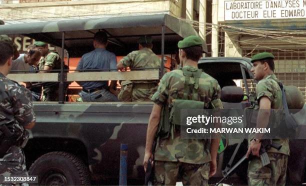 The Lebanese army, in charge of security for the poll, arrests seven Lebanese in Burj Hammoud, an Armenian neighborhood of Beirut, 27 August 2000...