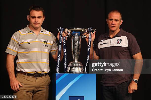 Trevor Woodman of London Wasps poses with Brian Smith of London Irish for photos during the UK Heineken Cup and Amlin Challenge Cup season launch at...