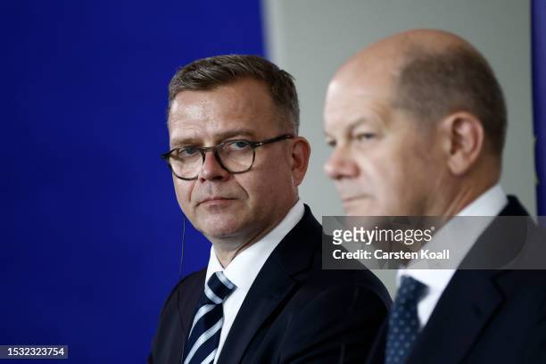 German Chancellor Olaf Scholz and new Finnish Prime Minister Petteri Orpo attend a press conference at the Chancellery on July 14, 2023 in Berlin,...