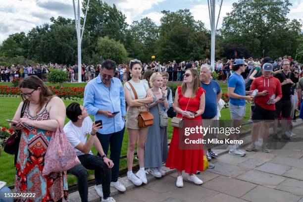 Tourists and domestic visitors at Buckingham Palace wait in huge numbers for Changing of the Guard to take place on 9th July 2023 in London, United...