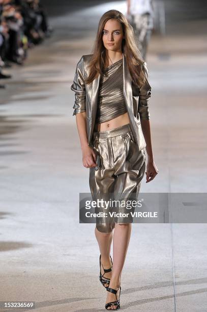 Model walks the runway during the Antony Vaccarello Spring / Summer 2013 show as part of Paris Fashion Week on September 25, 2012 in Paris, France.