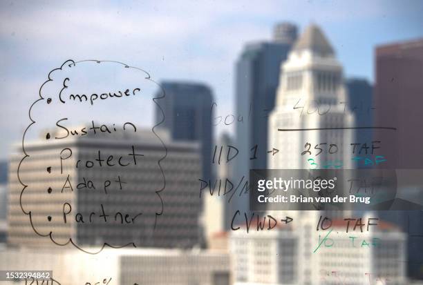 Los Angeles, CA A 'mission statement' written on the window of MWD manager Adel Hagekhalil's office overlooking DTLA at MWD headquarters on...