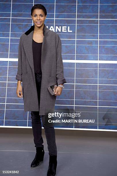 German singer Ayo poses during a photocall prior to the Chanel Spring/Summer 2013 ready-to-wear collection show on October 2, 2012 at the Grand...