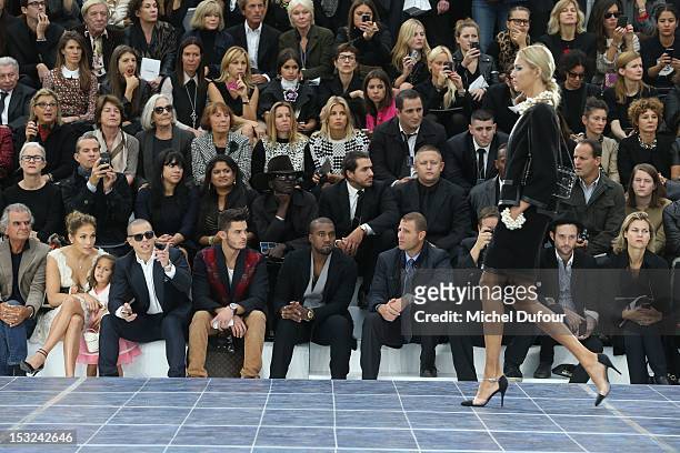Jennifer Lopez, her daughter Emme Maribel Muniz and her boyfriend Casper Smart, Baptiste Giabiconi and Kanye West attend the Chanel Spring / Summer...